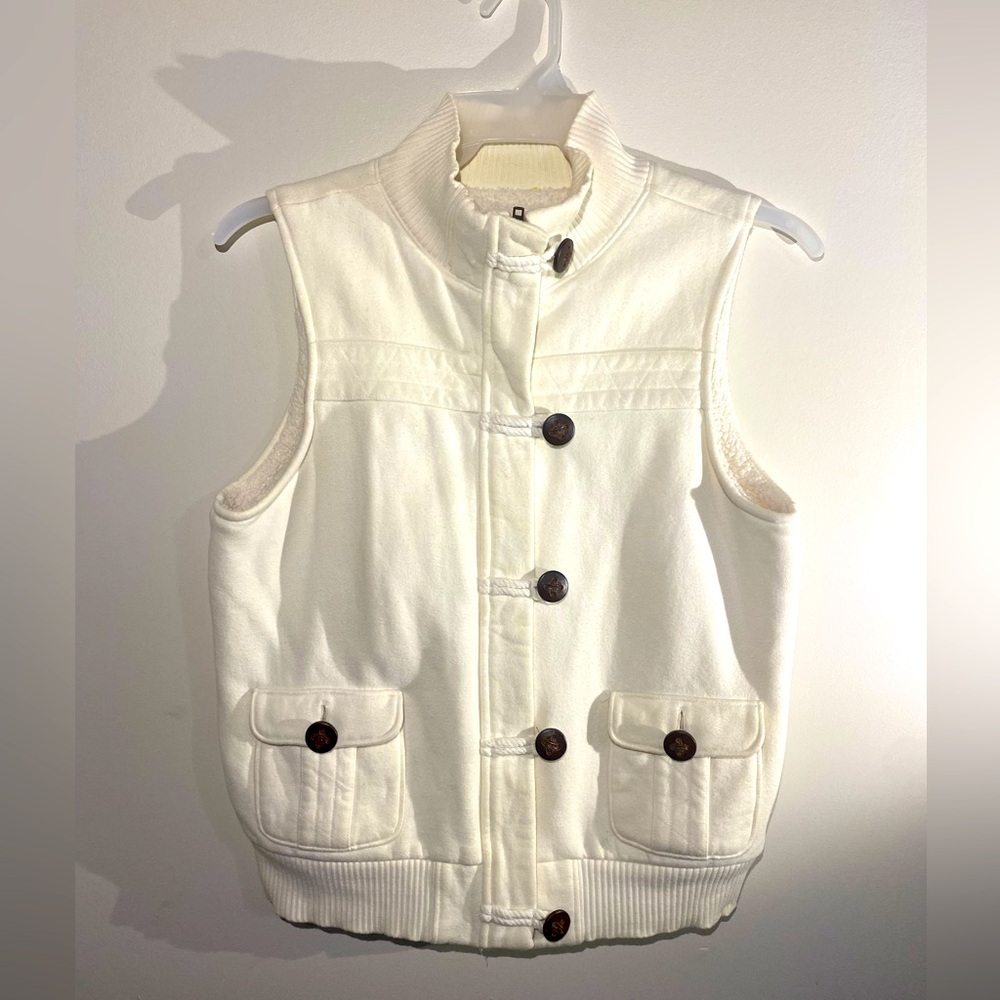 Old Navy large cream vest with buttons. Small spot on back.